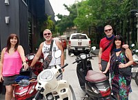 Family on a scooter tour