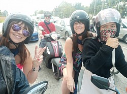 Be a passenger on a scooter tour